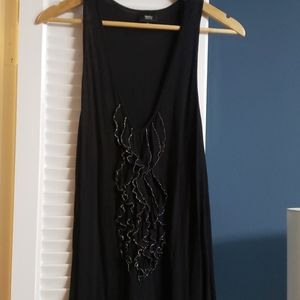 Tank with sparkly ruffles.